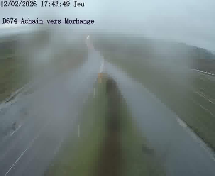 <h2>Caméra de trafic sur D674 (France) à Achain, orientée vers Morhange, permettant d’évaluer fluidité, incidents et densité automobile.</h2>